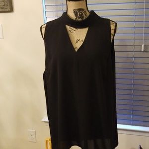 Sexy black top. Sleeveless.